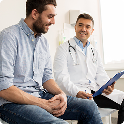 Doctor speaking with patient