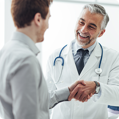 Doctor shaking patients hand